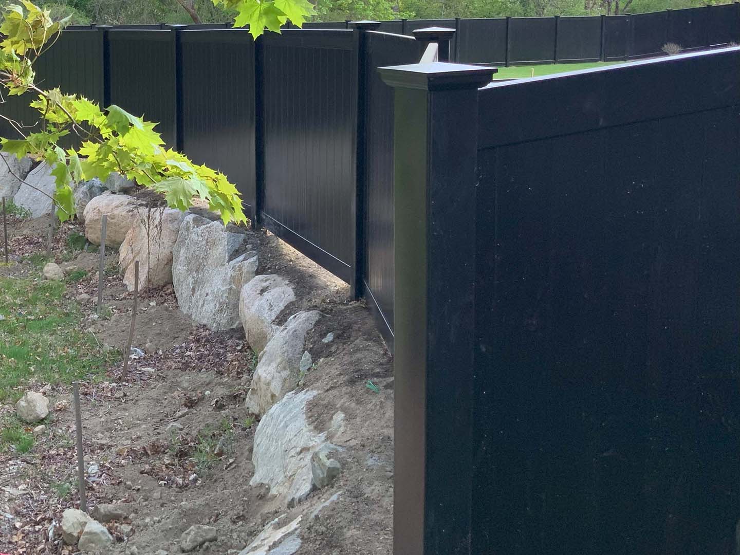 Black Full-Privacy Vinyl Fence for Homes or Businesses in Tewksbury MA