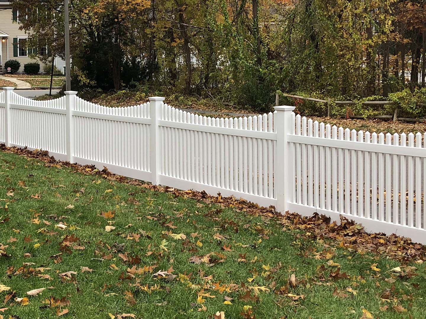 White Vinyl Scalloped Picket Fence for Residential or Commercial Properties in Tewksbury MA