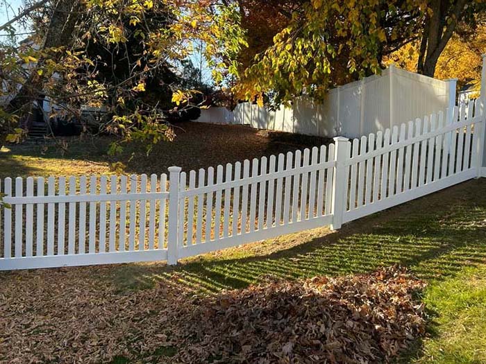 Tewksbury MA White Vinyl Picket Fence for Sloped Yrards