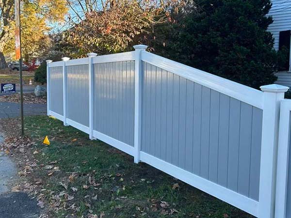 Two-Tone Vinyl Privacy Fence for Homes or Businesses in Tewksbury MA