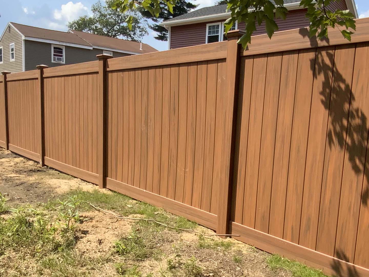 Tewksbury MA Full-Privacy Wood Grain Vinyl Fence for Homes or Businesses in Tewksbury MA 