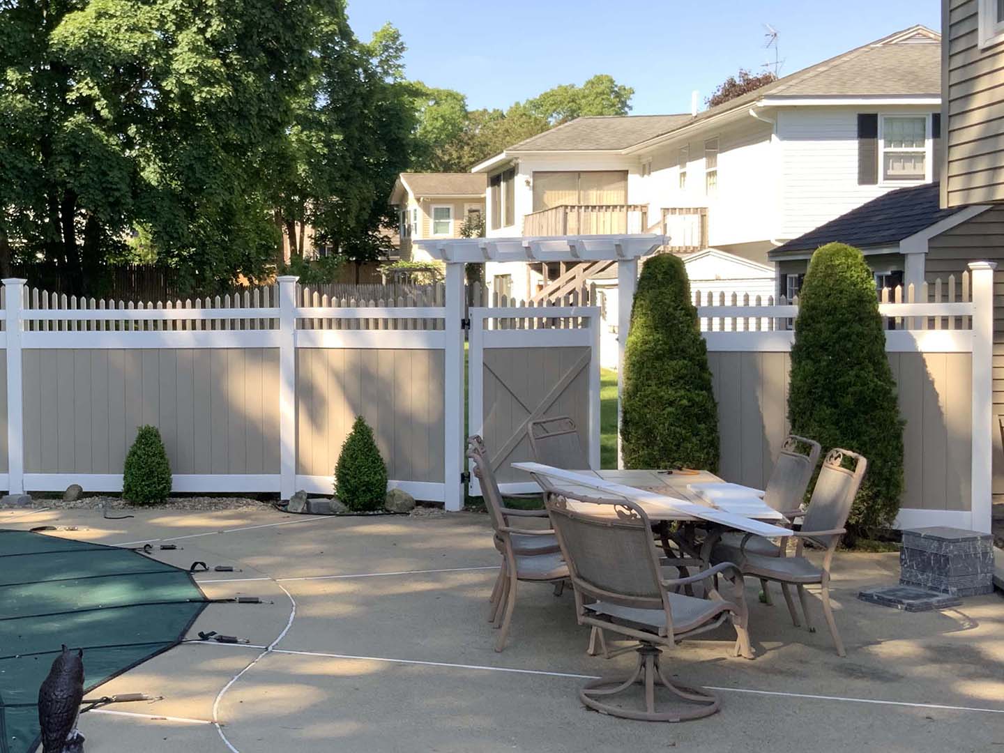 Two-Tone Vinyl Semi-Privacy Pool Fence With Single Gate and Pergola in Tewksbury MA