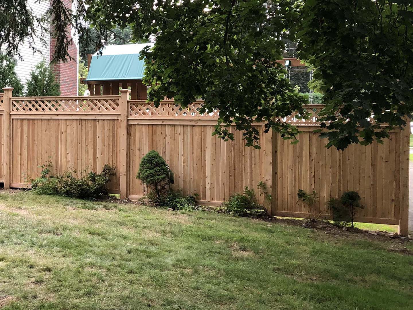 Semi-Privacy Wood Fence With Lattice Top for Homes in Tewksbury MA