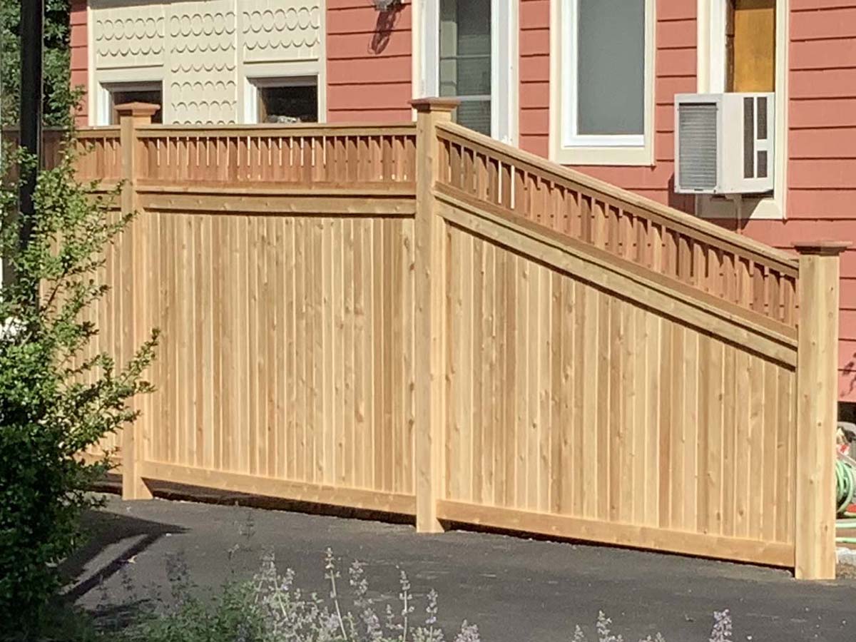 Tewksbury MA Wood Fence With Closed Spindle Top for Residential or Commercial Properties