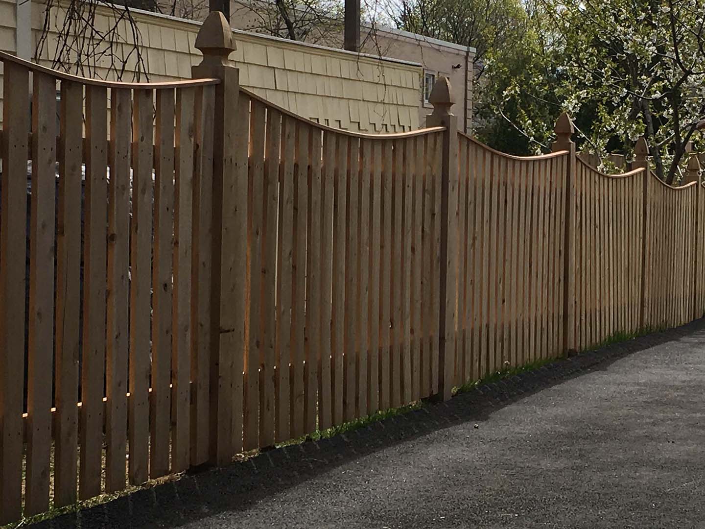 Semi-Privacy Wood Fence With Scalloped Top for Residential or Commercial Properties in Tewksbury MA