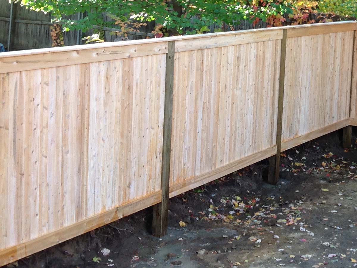 Full-Privacy Wood Fence With Cap and Trim for Homes or Businesses in Tewksbury MA